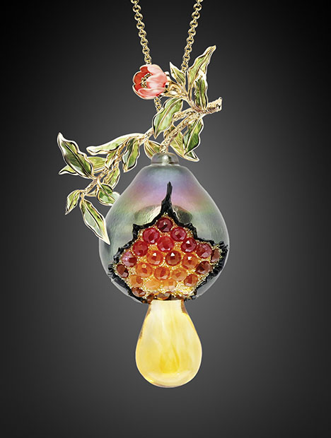 Figure 26. “The Secret of Life Is in the Seed” blends Huynh’s jewelry design and painting talents. Winner of a 2018 JCK Jewelers’ Choice Award, the piece features a large Tahitian drop pearl resembling a fruit, tourmalines as the seeds, a citrine to represent a dewdrop, and leaves and a flower painted by hand with lacquer rather than enameled. Courtesy of Chi Huynh.