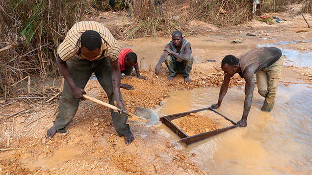 Figure 11. Artisanal miners washing sediments along the Njuga River to recover fancy sapphires and other gem fragments in 2016 near Amani Makoro, a few kilometers from Songea in southern Tanzania. Photo by Wim Vertriest. Figure 11. Artisanal miners washing sediments along the Njuga River to recover fancy sapphires and other gem fragments in 2016 near Amani Makoro, a few kilometers from Songea in southern Tanzania. Photo by Wim Vertriest.