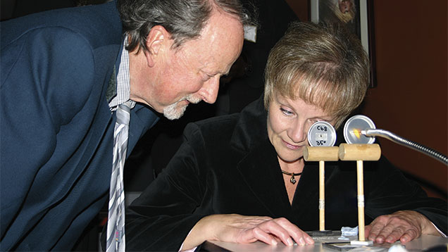 Alan Hodgkinson, shown teaching the use of the spectroscope in gem identification. Alan Hodgkinson, shown teaching the use of the spectroscope in gem identification.
