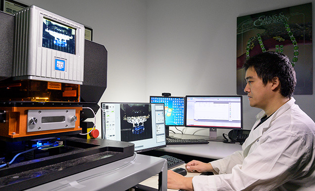 Figure 12. GIA’s laser ablation–inductively coupled plasma–mass spectrometry (LA-ICP-MS) system for chemical analysis of small spots on the surface of polished gemstones. Photo by Kevin Schumacher. Figure 12. GIA’s laser ablation–inductively coupled plasma–mass spectrometry (LA-ICP-MS) system for chemical analysis of small spots on the surface of polished gemstones. Photo by Kevin Schumacher.