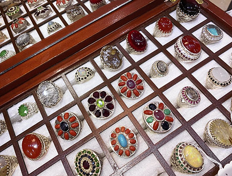 Figure 3. Nearly all of the stones in these rings offered in markets throughout Pakistan are synthetics or simulants or have been enhanced. Photo by Talha H. Bakht. Figure 3. Nearly all of the stones in these rings offered in markets throughout Pakistan are synthetics or simulants or have been enhanced. Photo by Talha H. Bakht.