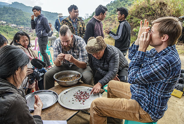Figure 2. Besides gemological and geologic aspects, the practice of field gemology allows gemologists to understand the culture, political dynamics, and trade complexities related to gemstones. Here field gemologists Wim Vertriest (seated center) and Aaron Palke (seated right) examine rough material from Wa Khan Sho, near Mogok, which produces ruby, sapphire, and spinel. Photo by Robert Weldon. Figure 2. Besides gemological and geologic aspects, the practice of field gemology allows gemologists to understand the culture, political dynamics, and trade complexities related to gemstones. Here field gemologists Wim Vertriest (seated center) and Aaron Palke (seated right) examine rough material from Wa Khan Sho, near Mogok, which produces ruby, sapphire, and spinel. Photo by Robert Weldon.