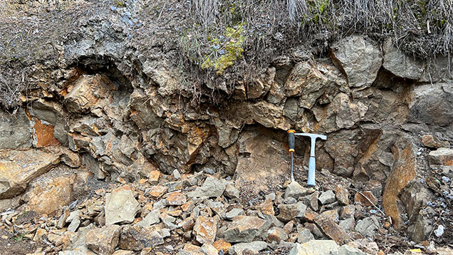 Figure 8. The French Bar sill composed of basaltic trachyandesite, occasionally containing sapphires, is poorly exposed partially on Center Bar and Virginia Bar, for a length of less than 98 m and a thickness of 1–2 m. Only a small portion is visible here. Photo by Robert E. Kane. Figure 8. The French Bar sill composed of basaltic trachyandesite, occasionally containing sapphires, is poorly exposed partially on Center Bar and Virginia Bar, for a length of less than 98 m and a thickness of 1–2 m. Only a small portion is visible here. Photo by Robert E. Kane.