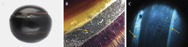 Three images: A) A black spherical object. B) A close-up of layered materials with an arrow indicating a feature. C) A blue-lit close-up showing textured lines with arrows pointing to details. Three images: A) A black spherical object. B) A close-up of layered materials with an arrow indicating a feature. C) A blue-lit close-up showing textured lines with arrows pointing to details.