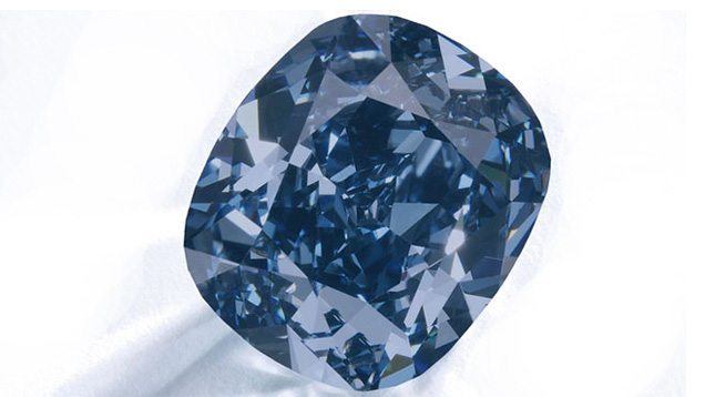 The $48 million Blue Moon Josephine, a 12.08 ct Fancy Vivid blue, has become the most expensive gemstone ever sold at auction. Its $4 million per carat price exceeded the previous record by $1 million. Photo courtesy Sotheby’s The $48 million Blue Moon Josephine, a 12.08 ct Fancy Vivid blue, has become the most expensive gemstone ever sold at auction. Its $4 million per carat price exceeded the previous record by $1 million. Photo courtesy Sotheby’s