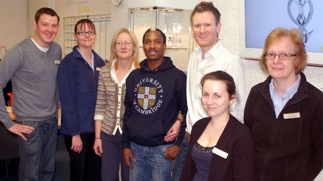 6. Nkosi poses with the team at Weston Beamor, a precious metal casting house located in Birmingham, UK.