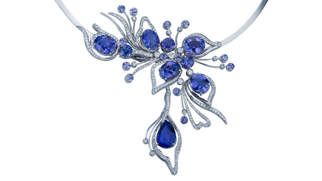 In this image, the tanzanite centerpiece is positioned in such a way to call immediate attention to the picture. The plain platinum necklace behind is not important enough to show it in its entirety. In this image, the tanzanite centerpiece is positioned in such a way to call immediate attention to the picture. The plain platinum necklace behind is not important enough to show it in its entirety. Courtesy of the Tanzanite Foundation.