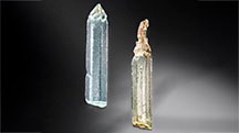 Figure 1. These aquamarine (left) and heliodor (right) crystals reported to be from China, measuring approximately 2 cm long and 0.4 cm wide, display distinctive etch pits. Photo by Adriana Robinson. Gift of Zeng Jiliang, GIA Museum nos. 20633 (left) and 20630 (right). Figure 1. These aquamarine (left) and heliodor (right) crystals reported to be from China, measuring approximately 2 cm long and 0.4 cm wide, display distinctive etch pits. Photo by Adriana Robinson. Gift of Zeng Jiliang, GIA Museum nos. 20633 (left) and 20630 (right).