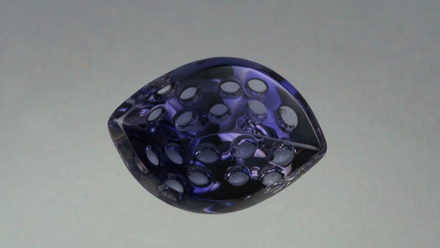 The cutter took full advantage of this iolite’s color and transparency, fashioning it into a uniquely carved gem, ready for use in jewelry. – Lydia Dyer, Gem courtesy John Dyer & Co.