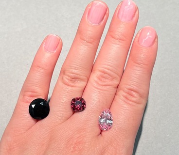 The Winston Red diamond (center), alongside the “red-brown” DeYoung Red (left, 5.03 ct) and the DeYoung Pink diamonds (right, 2.82 ct). All three stones are currently on public exhibit at the Smithsonian NMNH. Photo by Gabriela Farfan.