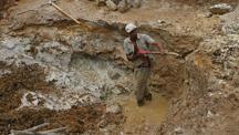 Independent topaz miners search for imperial topaz near the Capão mine in Ouro Prêto in Minas Gerais, Brazil.
