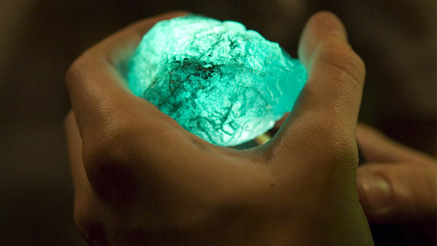 A miner holds an emerald in the mine office in the village of Coscuez, Colombia. Photo by Eric Welch/GIA A miner holds an emerald in the mine office in the village of Coscuez, Colombia. Photo by Eric Welch/GIA