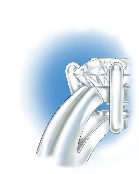 Close-up side view of platinum, four-prong solitaire with a round center stone Close-up side view of platinum, four-prong solitaire with a round center stone
