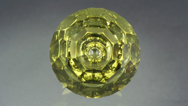 John Dyer’s Lime Citrine Reflections™ is a gem with an attractive lime green color, a fascinating designer cut, and a weight of 33.35 carats. – Lydia Dyer, gem courtesy of John Dyer & Co.