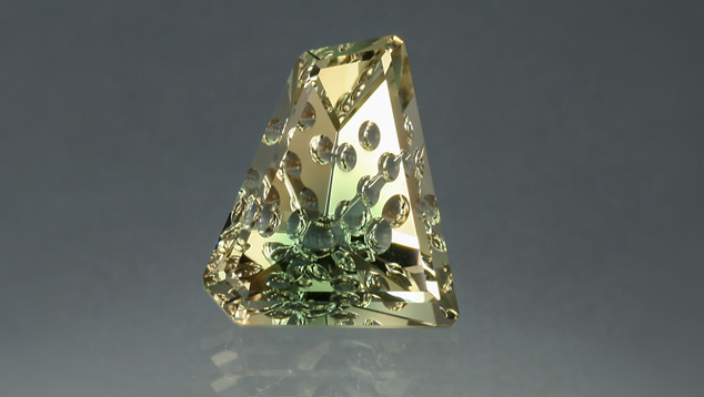 This “Dreamscape” fantasy-cut sunstone was created by gem designer John Dyer. – Lydia Dyer, Gem courtesy of John Dyer & Co. This “Dreamscape” fantasy-cut sunstone was created by gem designer John Dyer. – Lydia Dyer, Gem courtesy of John Dyer & Co.