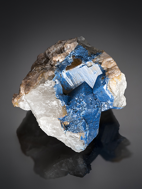 Shattuckite typically forms aggregates of circular to spherulitic masses composed of acicular crystals Shattuckite typically forms aggregates of circular to spherulitic masses composed of acicular crystals