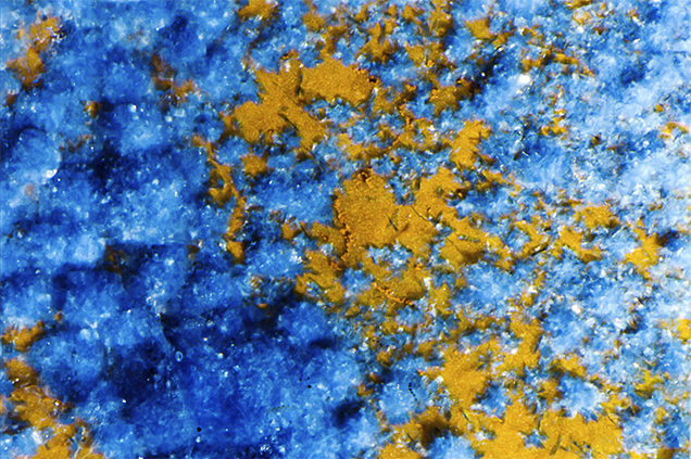 Figure 2. Measuring 41.27 mm and weighing 164.63 ct, this quartz crystal cluster contains a phantom composed of an abundance of deep blue radial concretions of shattuckite, forming a rich blue felted mat. Photo by Kevin Schumacher. Figure 2. Measuring 41.27 mm and weighing 164.63 ct, this quartz crystal cluster contains a phantom composed of an abundance of deep blue radial concretions of shattuckite, forming a rich blue felted mat. Photo by Kevin Schumacher.